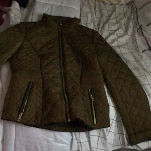 Green puffer jacket form fitting